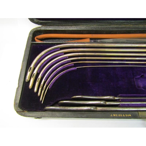 229 - A boxes set of silver catheters by J Weiss & Son, Strand, London, presented in 1876.  Not assayed bu... 