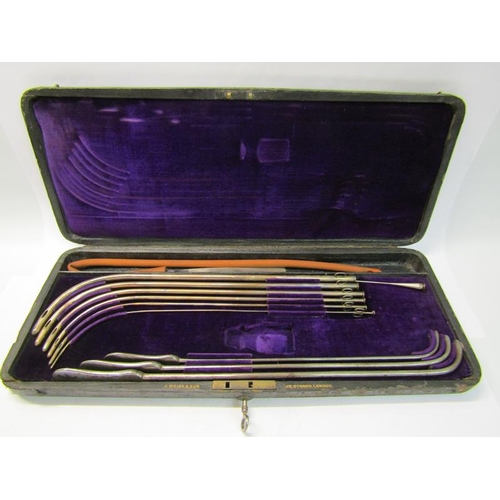 229 - A boxes set of silver catheters by J Weiss & Son, Strand, London, presented in 1876.  Not assayed bu... 