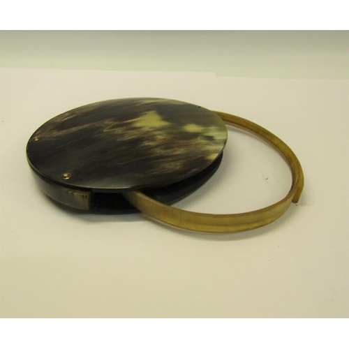 70 - A horn magnifying glass with a 10cm diam lens which folds into the case.