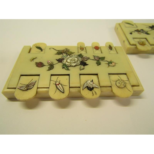 71 - A pair of Meiji period ivory whist markers, the keys mounted with mother of pearl and painted insect... 