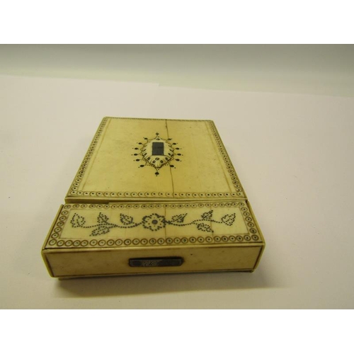 74 - A late Georgian ivory visiting card case with two opposing raised motifs within pin decorated border... 