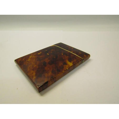 77 - A late 19c tortoiseshell visiting card case with ivory rims, 8cm x 10.5cm.