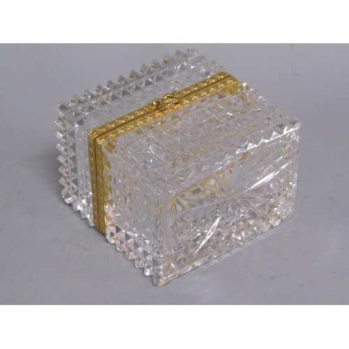 255 - A late 19c/early 20c French clear glass casket, diamond cut throughout with a star cut base, the hin... 