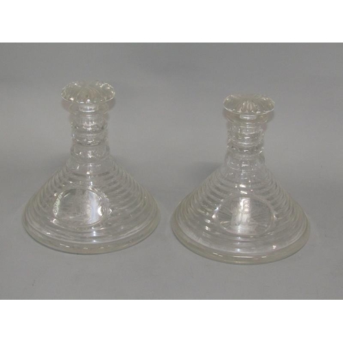 258 - A pair of 19c ships decanters of stepped cut design, engraved with oval panels of sailing vessels an... 