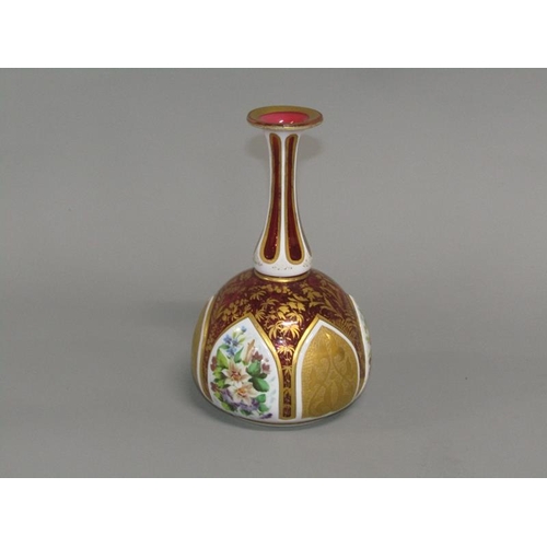 260 - A 19c Bohemian ruby glass vase of baluster form gilt decorated and with lappet shaped floral painted... 