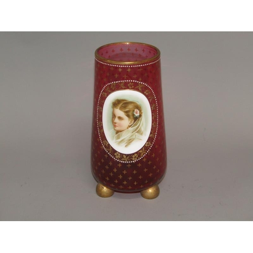 261 - A 19c Bohemian ruby glass vase of tapering baluster form with a white opaque portrait painting of a ... 