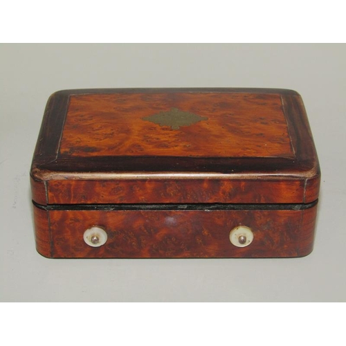 14 - A late 19c Swiss miniature music box in burr walnut cased with ebonised edging to the lid which has ... 