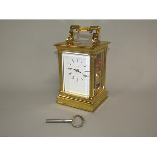 7 - A late 20c Swiss carriage clock by Matthew Norman in glazed brass Corinthian case with fluted column... 