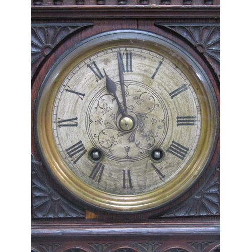 9 - A late 19c German mantel clock by Lenzkirch in carved oak case of rectangular form with circular col... 