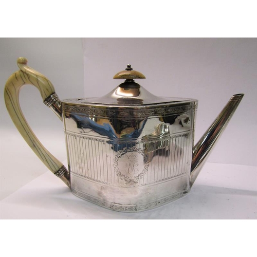 236 - A George III silver teapot, chased and decorated in a Regency style with a straight spout and bone h... 