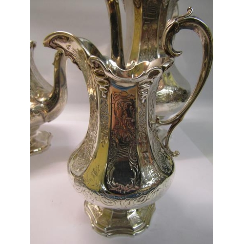 239 - A mid Victorian silver four piece tea and coffee service of chased facet baluster form, the coffee a... 