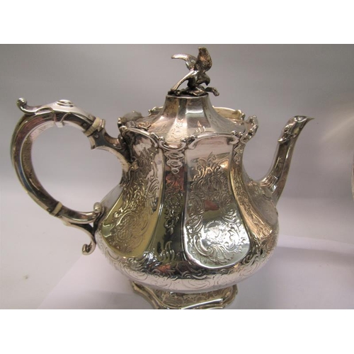 239 - A mid Victorian silver four piece tea and coffee service of chased facet baluster form, the coffee a... 