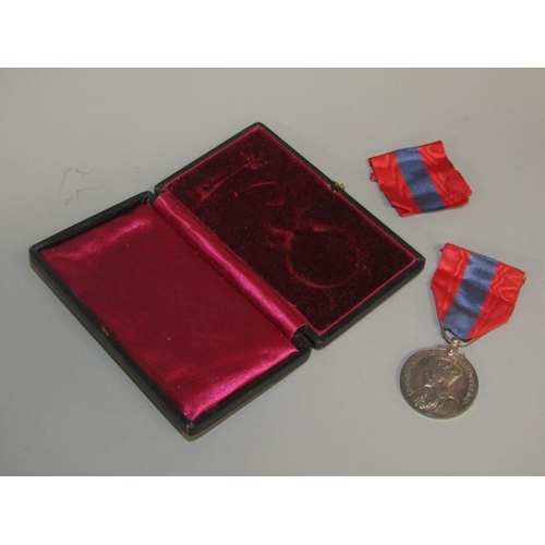 102 - A George V Faithful Service medal awarded to Frederick William Reeve, in presentation box.