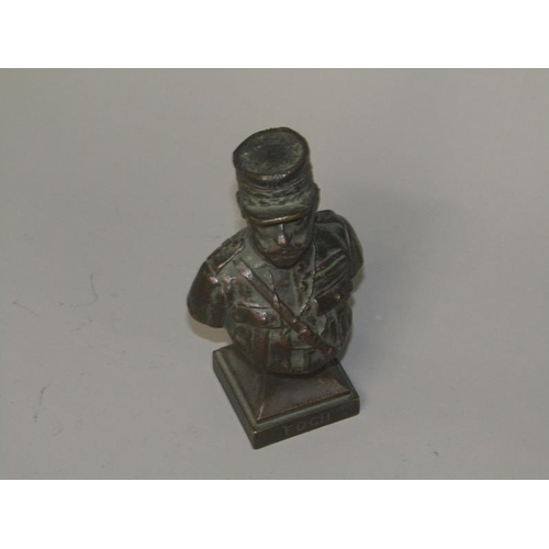 20 - An early 20c Elkington cast bronze sculpture of Foch in military uniform, 10.5cm h.