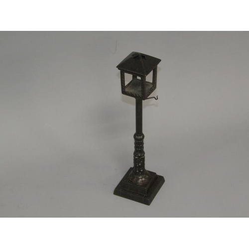 30 - A late 19c/early 20c Zimermann patinated street lamp watch stand candle holder, 29cm h.