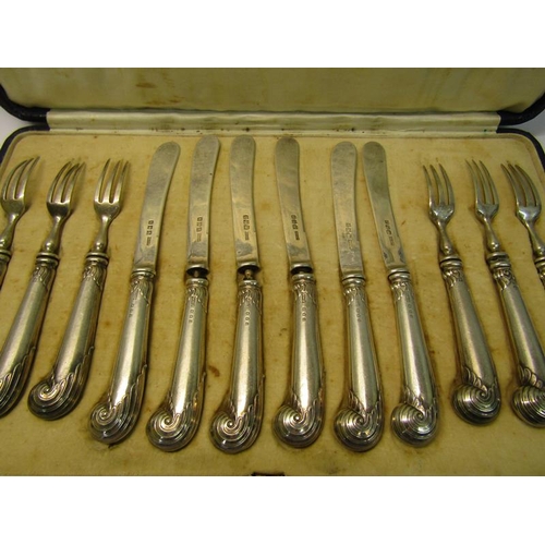 211 - A boxed set of six silver pistol grip dessert knives and forks, makers mark for Asprey & Co Ltd, Lon... 