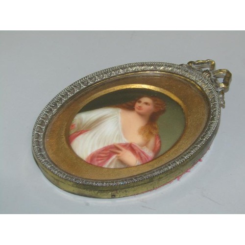 92A - An early 20c framed oval portrait porcelain painting miniature depicting a lady in classical pose, 5... 