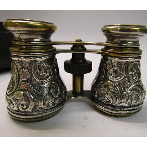 189B - A pair of late Victorian silver cased opera glasses in the original leather case, Birmingham 1889.