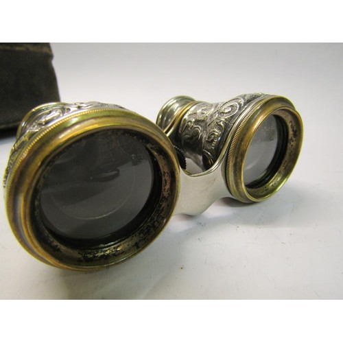 189B - A pair of late Victorian silver cased opera glasses in the original leather case, Birmingham 1889.