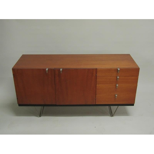 451 - A 1970's Stag teak sideboard fitted four short drawers and cupboard with fitted pull out cutlery tra... 