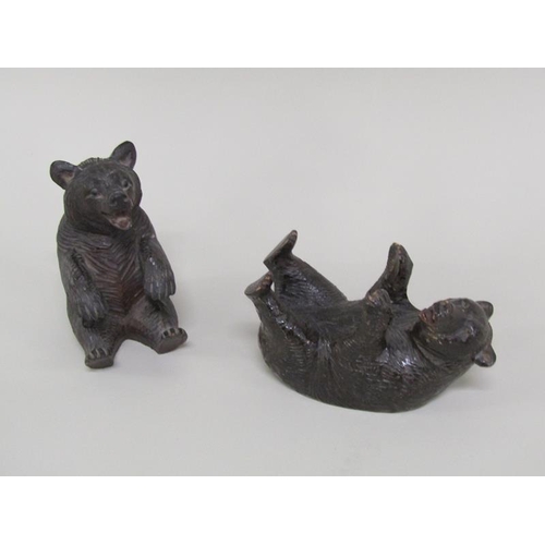 45 - A collection of ten late 19c/early 20c Black Forest carved wood bears of differing sizes and poses, ... 