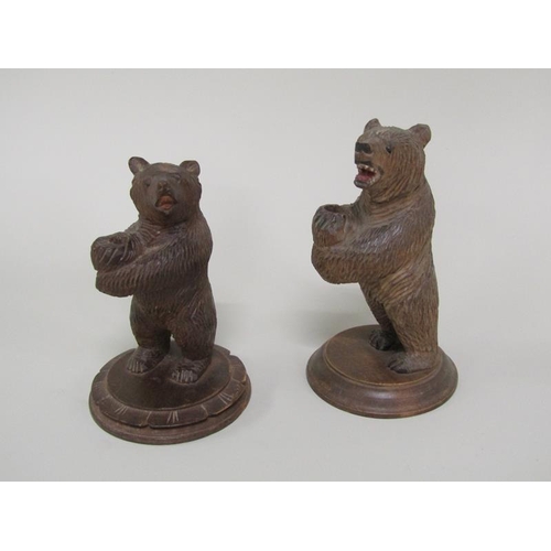 46 - Two early 20c Black Forest pen holders carved wood bears standing on circular bases, 12cm & 13cm h.