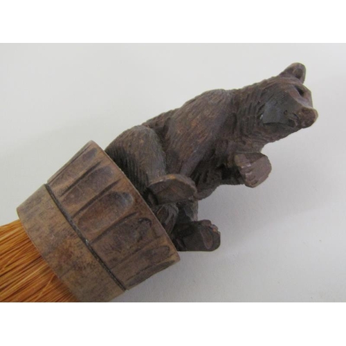 50 - Two early  20c Black Forest crumb brushes, both mounted with carved bears, 15cm & 17cm w.