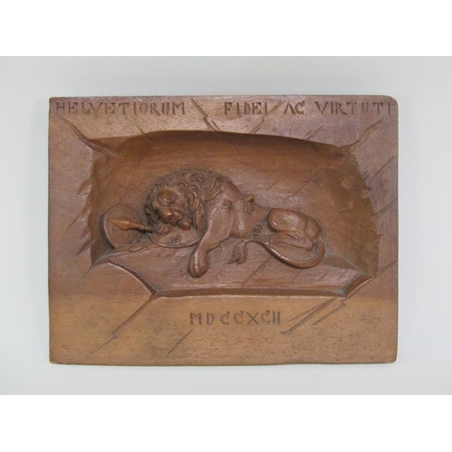 55 - Three late 19c/early 20c carved wood panels depicting the Lion of Lucerne, two of them bearing the R... 