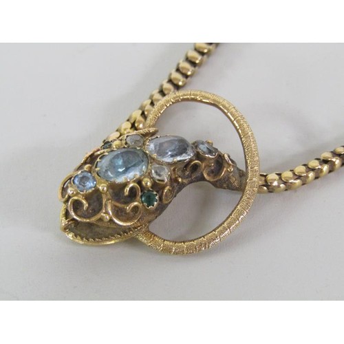 113A - An Edwardian gold snake necklace, the snake head with open mouth and set with aquamarine, diamond an... 