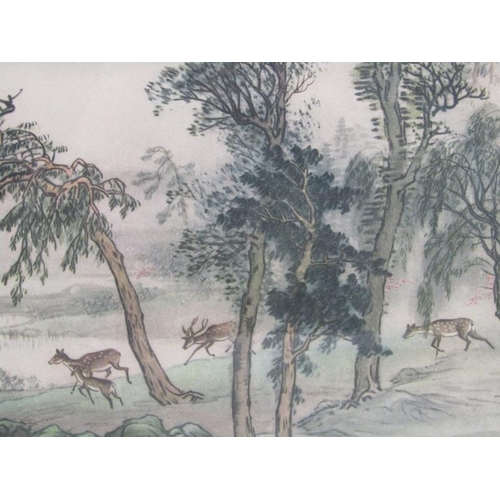 1183 - THREE ORIENTAL COLOURED PRINTS, TWO WINTER SUBJECTS AND ONE A HERD OF DEER WITH SCRIPT, EACH APPX 27... 