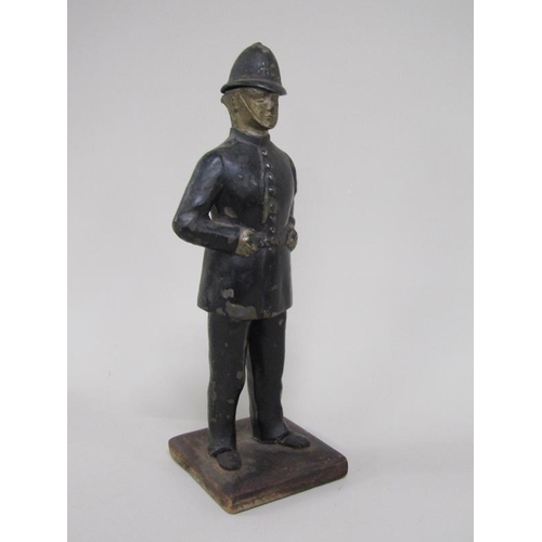 1337 - CAST METAL AND PAINTED POLICEMAN NOVELTY LIGHTER, STRIKE MISSING, 22.5CM H