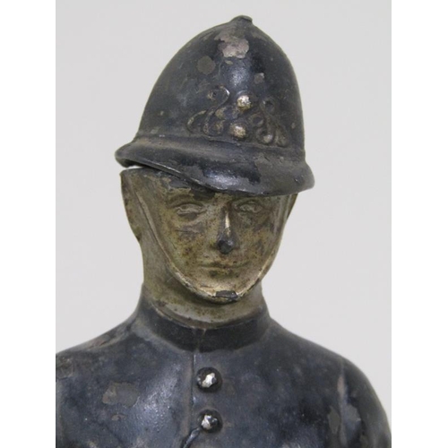 1337 - CAST METAL AND PAINTED POLICEMAN NOVELTY LIGHTER, STRIKE MISSING, 22.5CM H