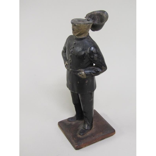 1337 - CAST METAL AND PAINTED POLICEMAN NOVELTY LIGHTER, STRIKE MISSING, 22.5CM H