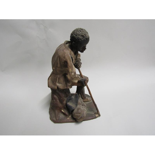 1619 - POTTERY FIGURE - AFRICAN BOY SEATED, A/F, 19CM H