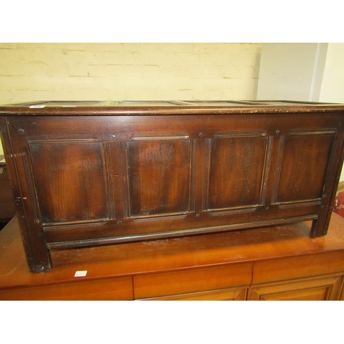 25 - ERCOL OAK FOUR PANEL COFFER, 110CM L, 84CM H