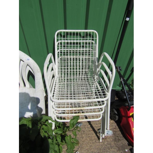 757 - TWO PLASTIC GARDEN BENCHES AND FOUR GARDEN CHAIRS