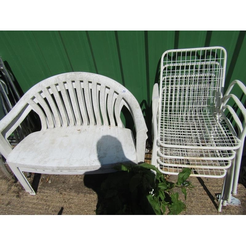 757 - TWO PLASTIC GARDEN BENCHES AND FOUR GARDEN CHAIRS