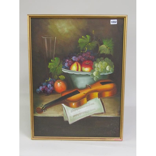 1052 - SIGNED INDISTINCTLY, THE VIOLIN AND THE FRUIT.  OIL ON CANVAS, FRAMED 63 x 46 cms