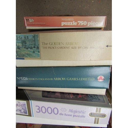 707 - TWO BOXES OF JIGSAWS ETC