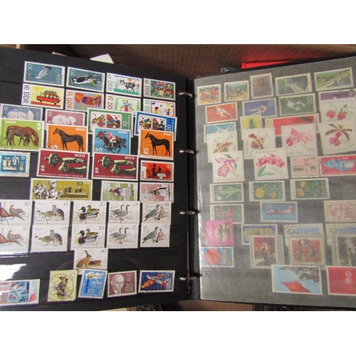 1445 - STAMP COLLECTION IN ALBUMS