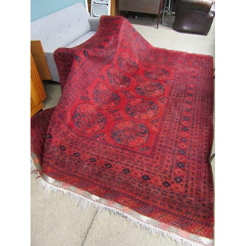 427 - LARGE ORIENTAL RED GROUND RUG