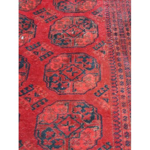 427 - LARGE ORIENTAL RED GROUND RUG