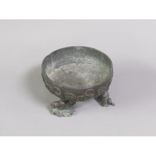 33 - A 19c Oriental patinated bronze censer in the form of a bowl, cast with flowers and crescents, suppo... 