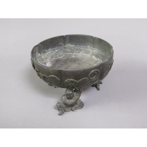 33 - A 19c Oriental patinated bronze censer in the form of a bowl, cast with flowers and crescents, suppo... 