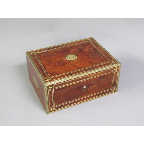 42 - A George III figure mahogany travelling box with brass edging, line inlay and motifs, fitted with th... 