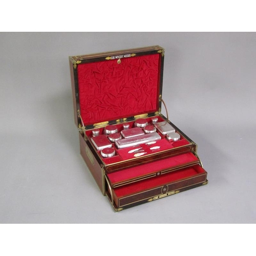 42 - A George III figure mahogany travelling box with brass edging, line inlay and motifs, fitted with th... 