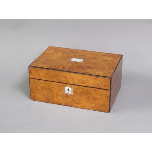 42 - A George III figure mahogany travelling box with brass edging, line inlay and motifs, fitted with th... 