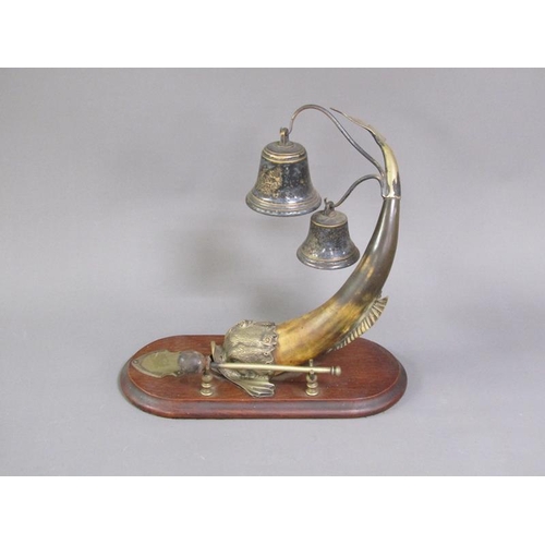 44 - A Victorian dinner gong in the form of a horn bodied dolphin with brass head, fin and tail, supporti... 