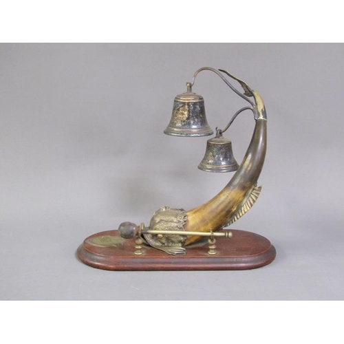 44 - A Victorian dinner gong in the form of a horn bodied dolphin with brass head, fin and tail, supporti... 