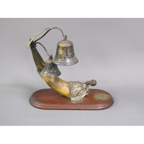 44 - A Victorian dinner gong in the form of a horn bodied dolphin with brass head, fin and tail, supporti... 